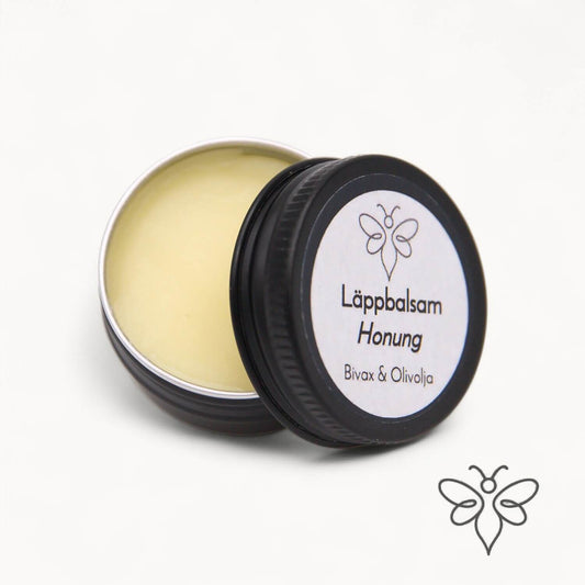 EneboBee läppbalsam Honung i svart metalldosa – naturligt och handgjort.
