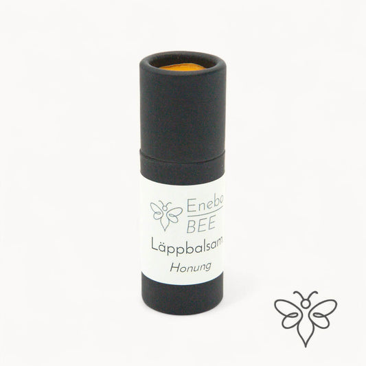 EneboBee läppbalsam Honung i svart pappstift – naturligt och handgjort.