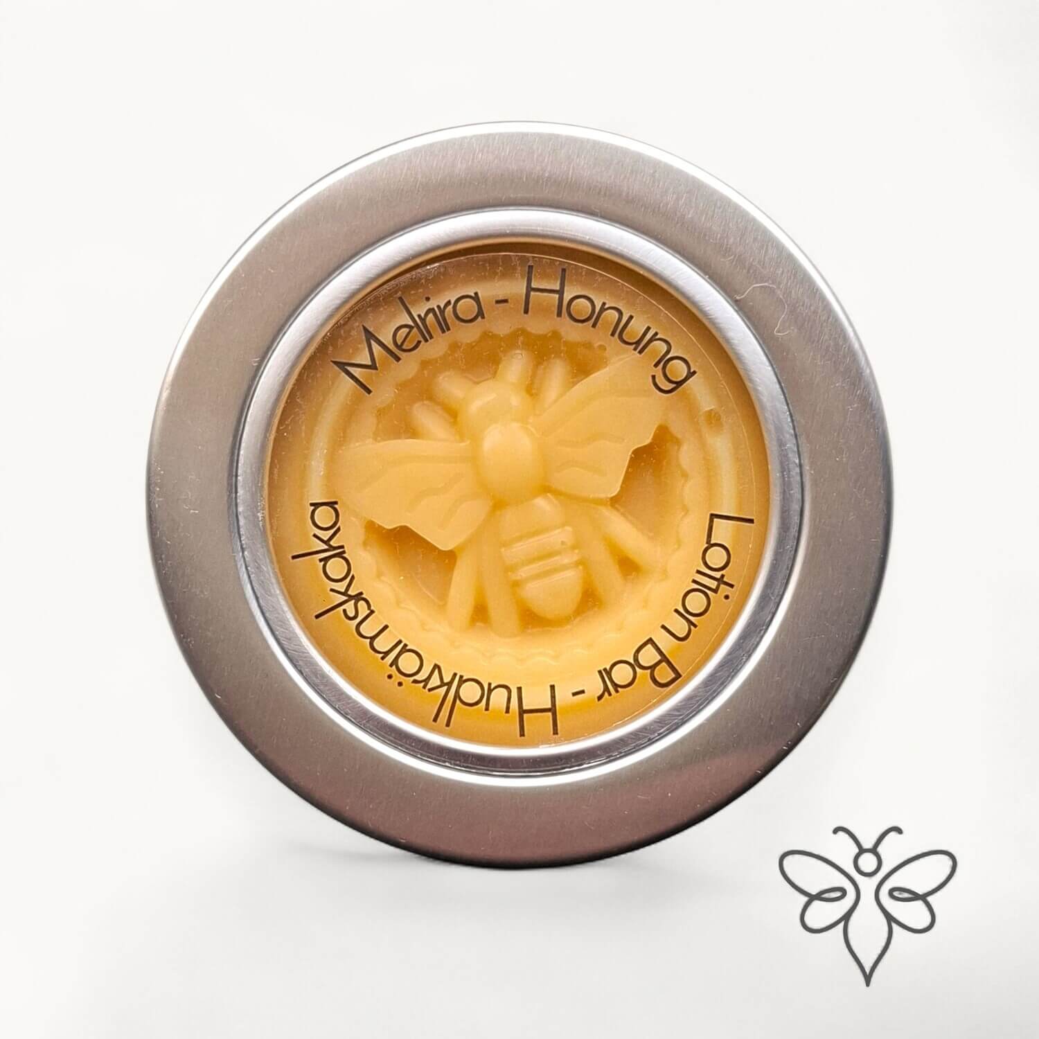 Stängd metallburk med EneboBee LotionBar – Melira.