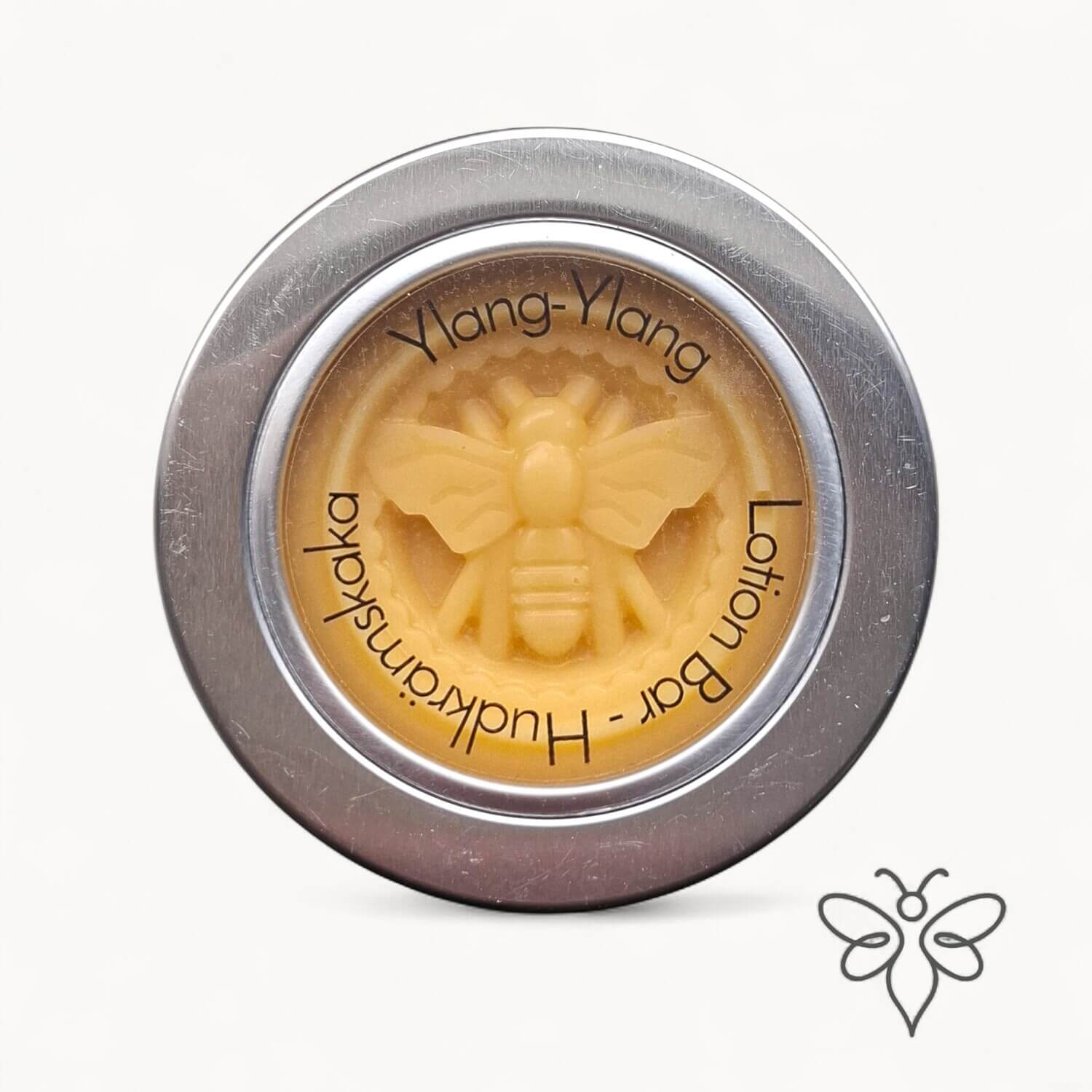 Stängd metallburk med EneboBee LotionBar – Ylang-ylang.