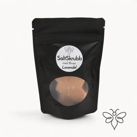 EneboBee saltskrubb med bivax och lavendeldoft – handgjord kroppsskrubb i svart ståpåse med fönster.
