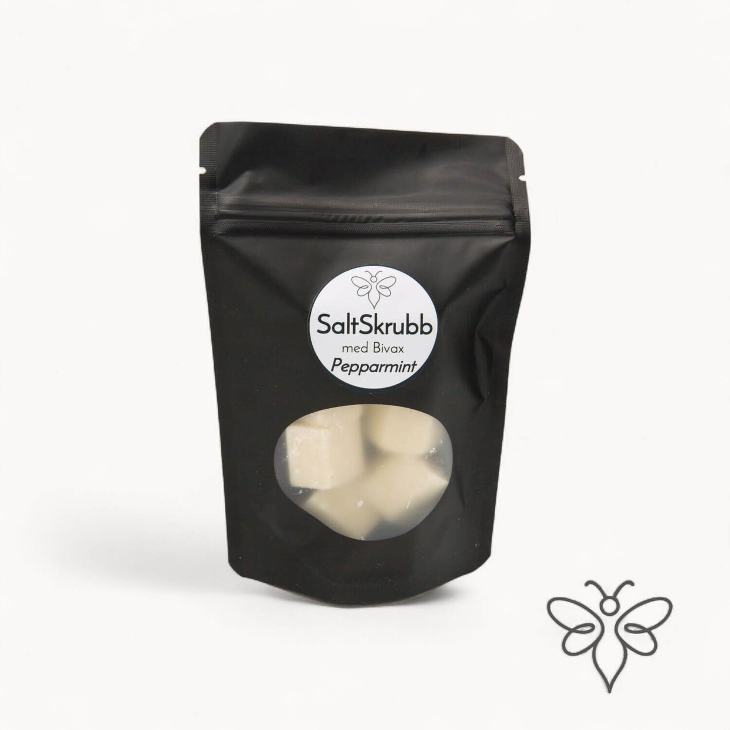EneboBee saltskrubb med bivax och doften Pepparmint – handgjord kroppsskrubb i svart ståpåse med fönster.