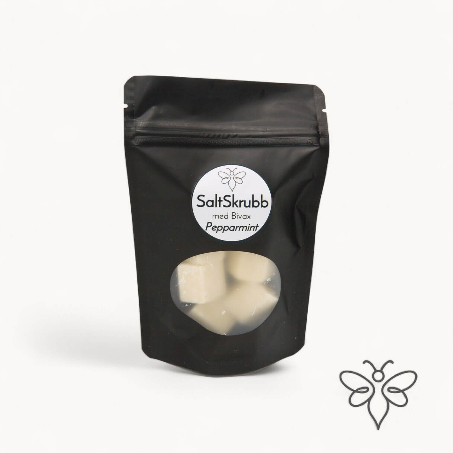 EneboBee saltskrubb med bivax och doften Pepparmint – handgjord kroppsskrubb i svart ståpåse med fönster.