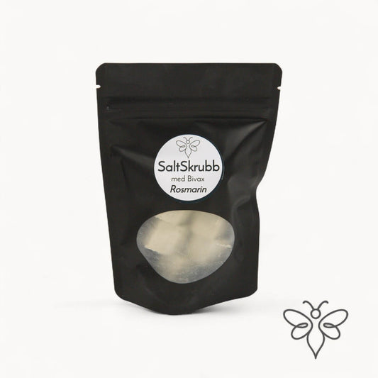 EneboBee saltskrubb med bivax och doften Rosmarin – handgjord kroppsskrubb i svart ståpåse med fönster.